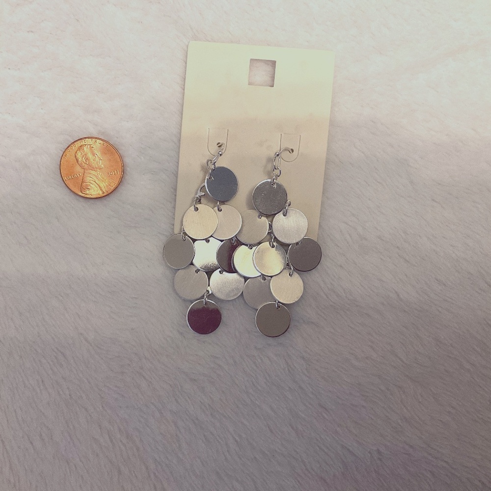 Pretty tiered silver coloured dangle earrings